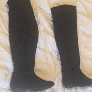Thigh high black cotton boots